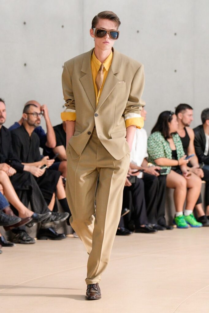Model on the runway wearing beige suit at Paris Fashion Week Men’s 2025