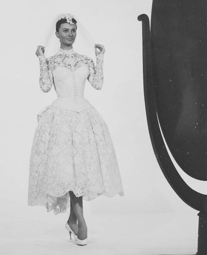 Sophia Loren, an Italian actress, wore a corset wedding dress in the 1958 film “Houseboat,” which influenced Lauren Sánchez’s Dolce & Gabbana mermaid wedding gown when she married Jeff Bezos in June 2025.