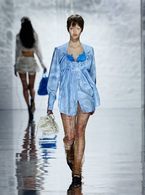 model wearing blue mini dress for the Berlin Fashion Week 2025
