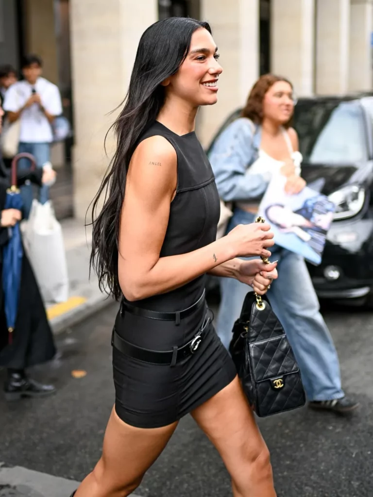 Dua Lipa, a music sensation, wore a sleeveless short dress inspired by Coperni’s Pre-Fall 2025 collection
