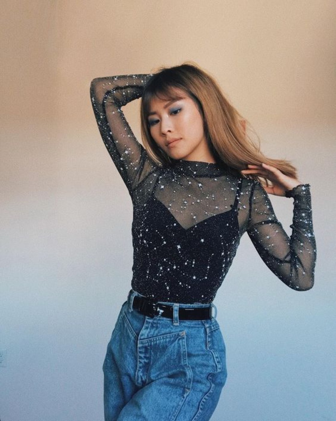 Unstoppable Glam: Glitter Mesh Top Trend to Rock Now