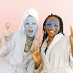 Girls wearing skincare colored masks