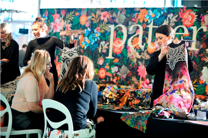 Buyers examine dresses at Première Vision New York