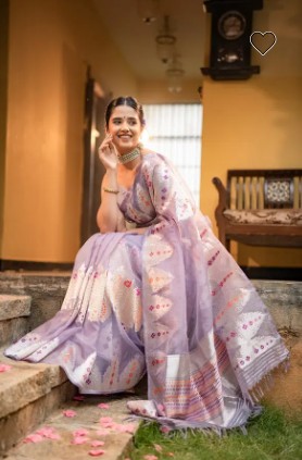 Girl wearing a Banarasi saree purple 