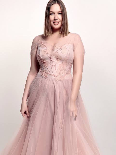 woman in pink dress  plus-size outfits