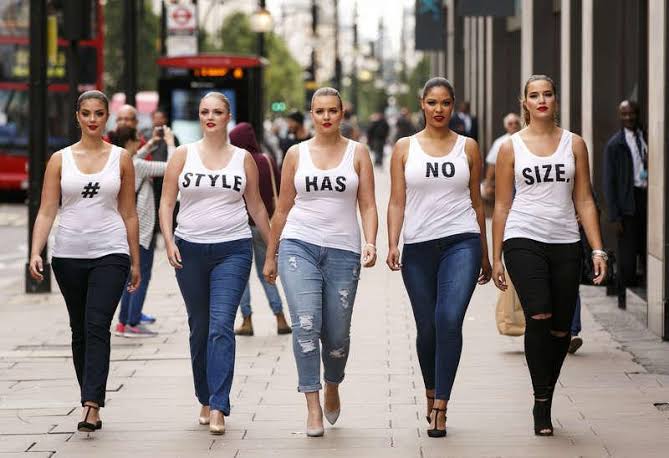 women in various jeans and white sleeveless Tee shirt that together that say #stylehasnosize  plus-size outfits