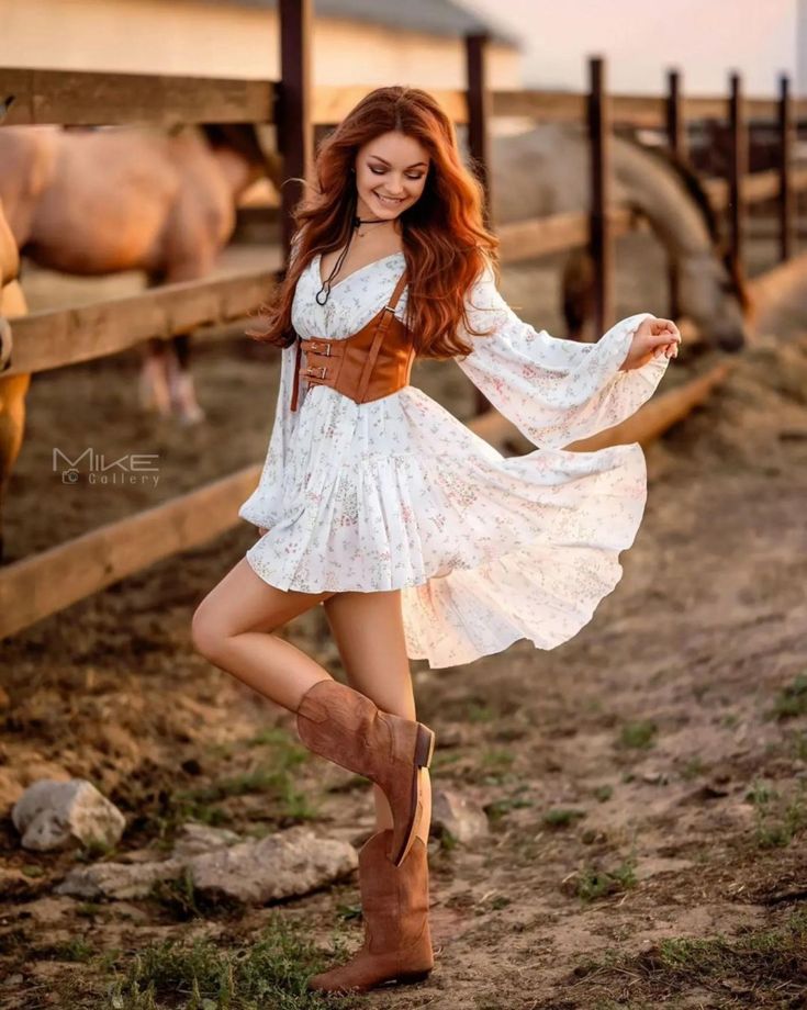 girl in cowboy boots and leather corset wearing Boho dress