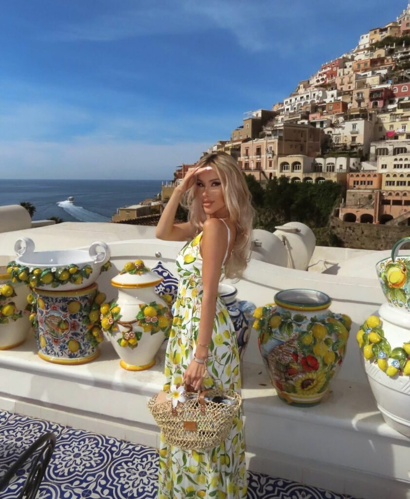 Blonde girl in Amalfi Aesthetic on Italain style balcony