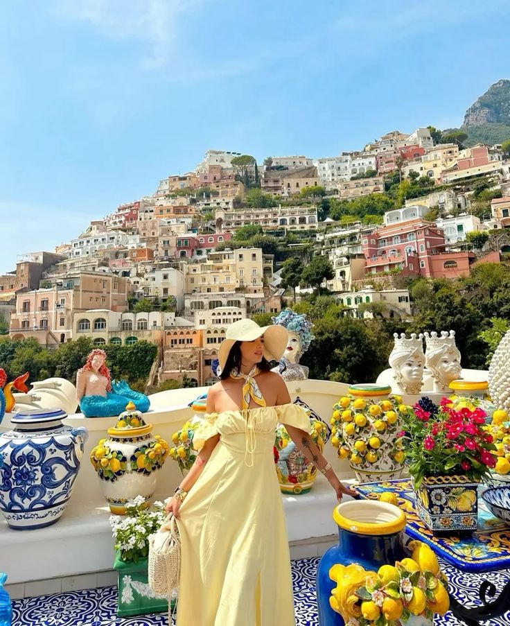 Woamn in Italian hillside scene wearing Amalfi Aesthetic style dress