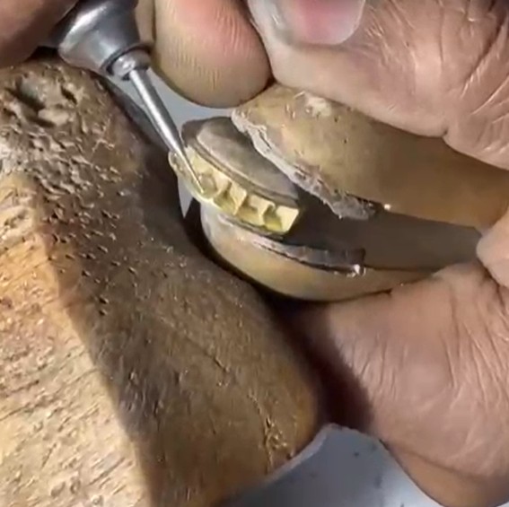 jewelry manufacturer technician hands working