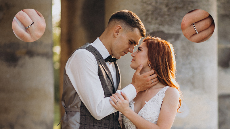 Man and woman gaze into each others eyes while wearing Ruby July birthstone rings