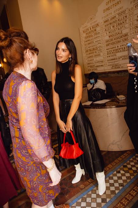 woman in black skirt and sleeveless top at Colombia Fashion Week 