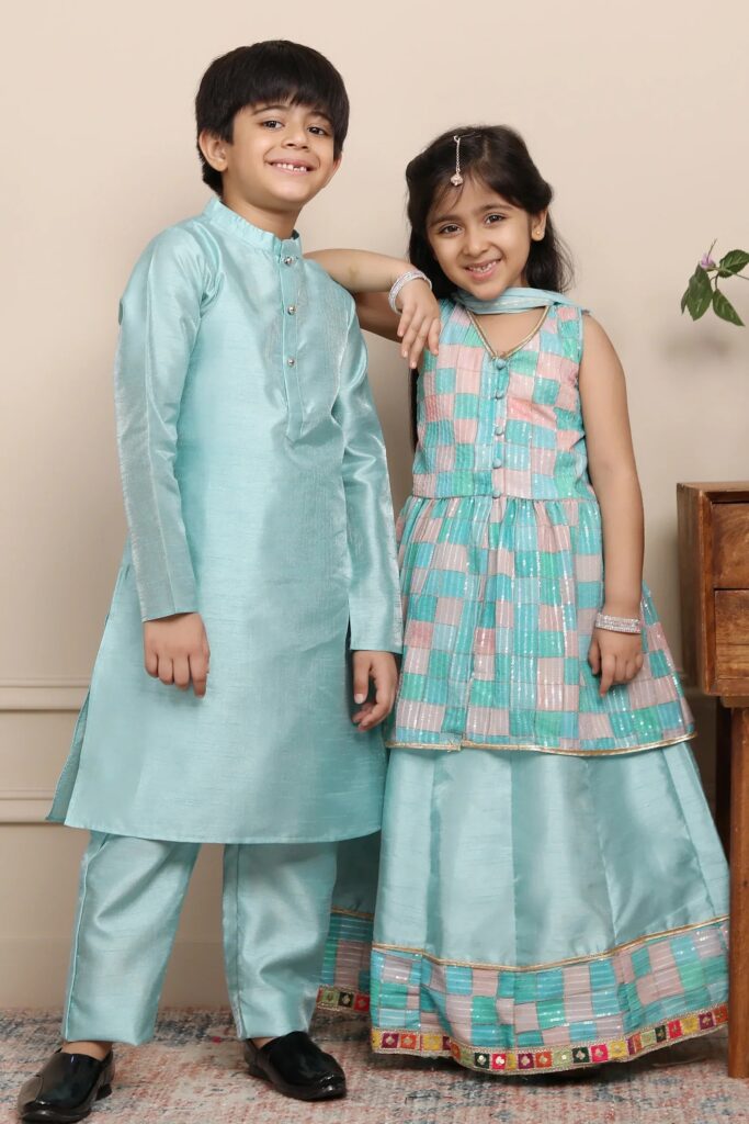 Shining Aqua Blue Lehenga and Peplum Top with Matching Kurta Pyjama