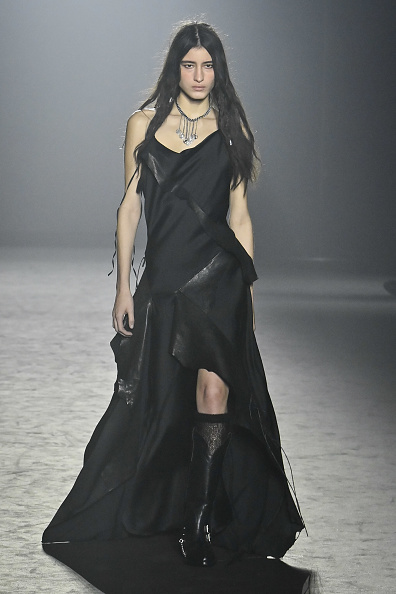 Ann Demeulemeester’s Women's Fall/Winter 2025/2026 collection featured a black dress with leather fabrics during Paris Fashion Week.