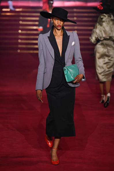 Willy Chavarria’s Spring/Summer 2026 ready-to-wear show at Paris Menswear Fashion Week featured a wide-brimmed hat, jacket, and midi skirt on the runway.