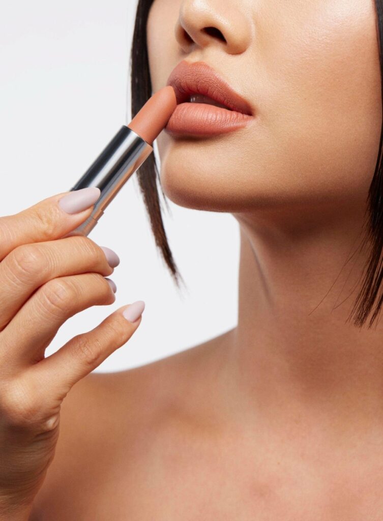 sodt lips applying lipstick 