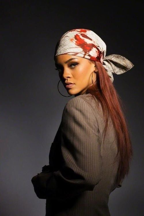 Model in head scarf displaying Scandi chic at the 2025 Copenhagen Fashion Week