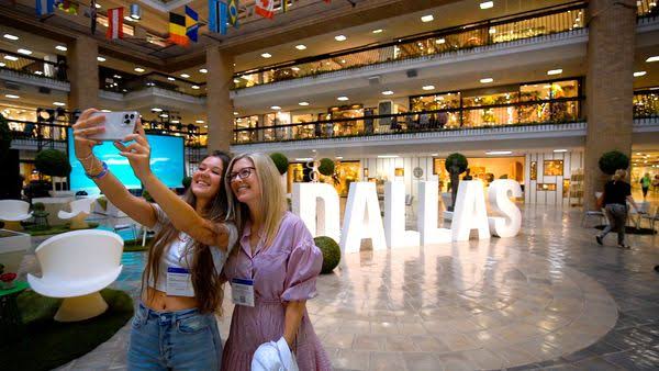 Two women taking a selfie at Dallas Apparel & Accessories Market