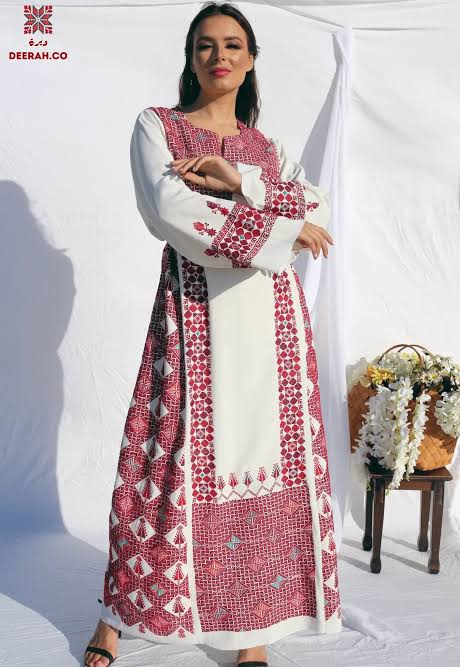 Model wearing white and red Palestinian fashion