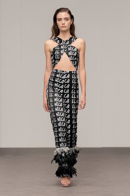 Dubai Fashion Week model in black graphic outfit 