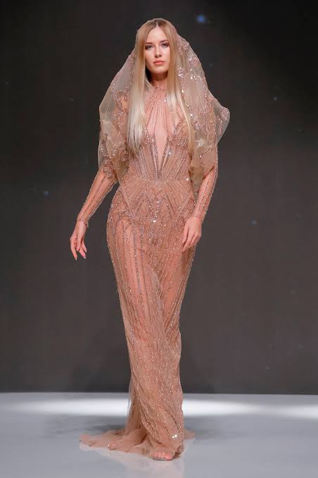 Model wearing a semi transparent dress 