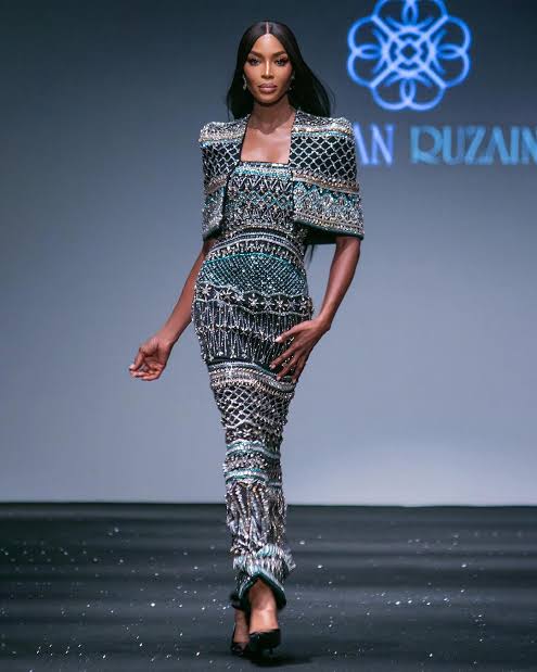 Model wearing blue dress 