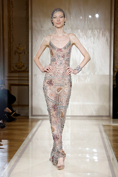 The Giorgio Armani Privé Haute Couture Spring/Summer 2025 “Lumières” ready-to-wear collection fashion show featured a sleeveless embroidered backless gown.