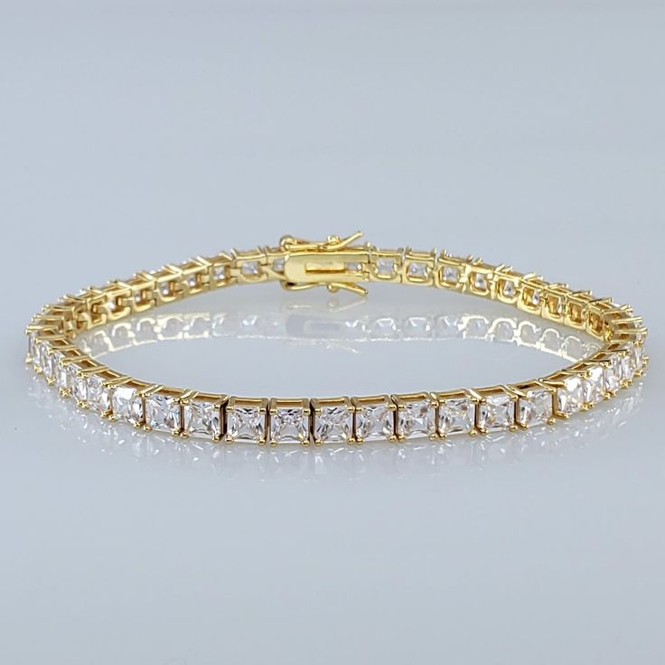 single tennis braclet in gold