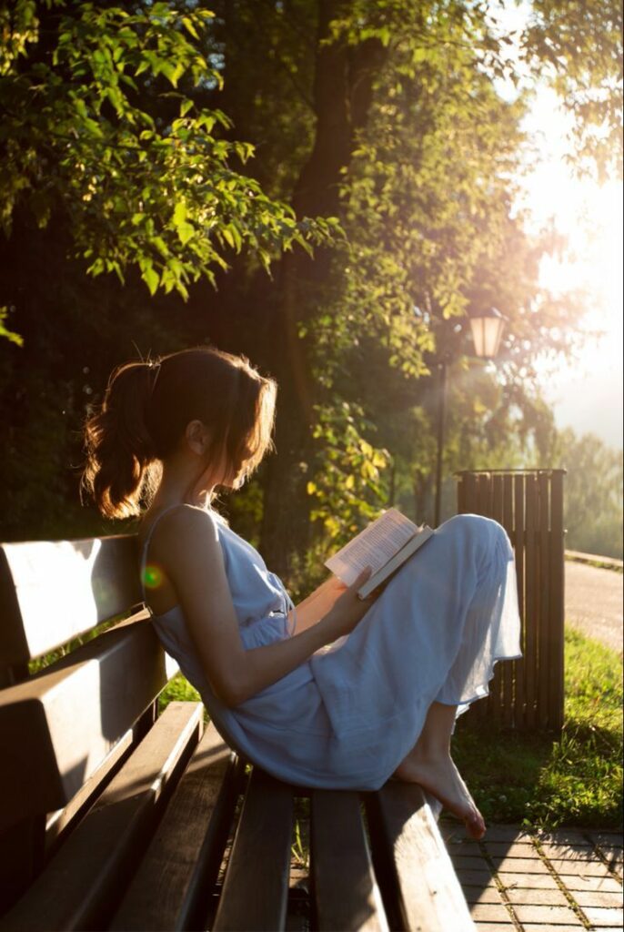 level up your life by reading like this girl reading a book