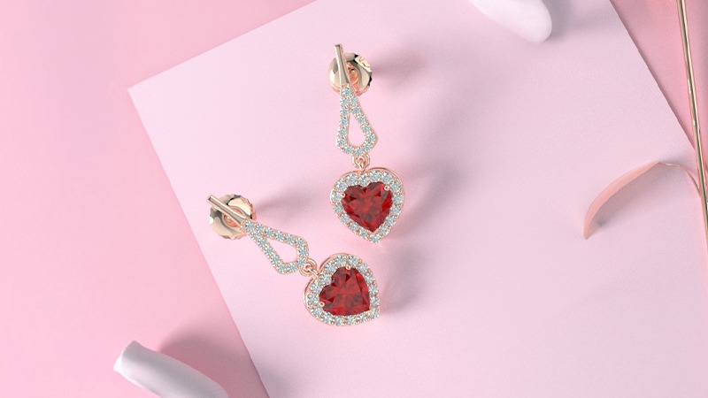 diamond halo ruby and diamond dangling earrings in rose gold