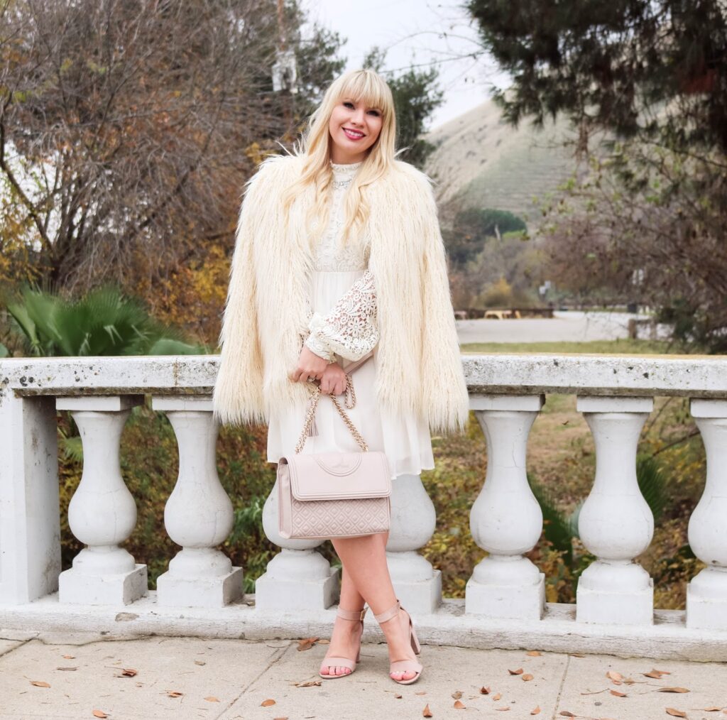 bland woman wearing an example of Christmas Dresses