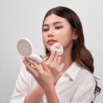 makeup product care and a woman applying makeup to face
