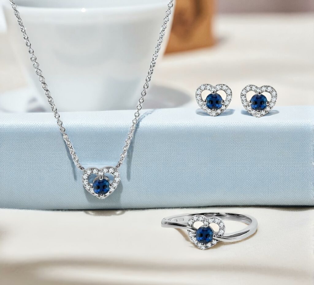 blue sapphire jewelry ring, necklace, and earrings