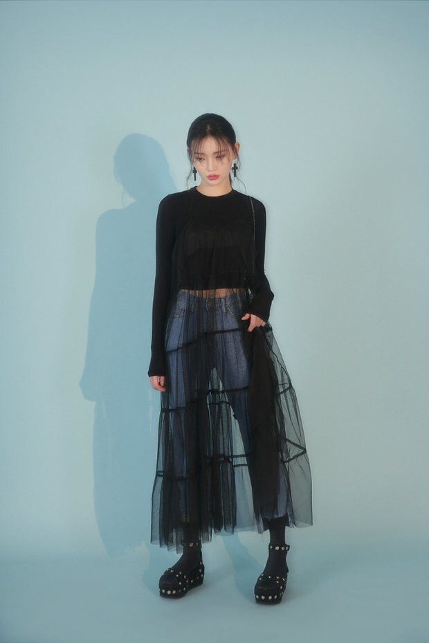 Asain Girl wearing sheer skirts over pants