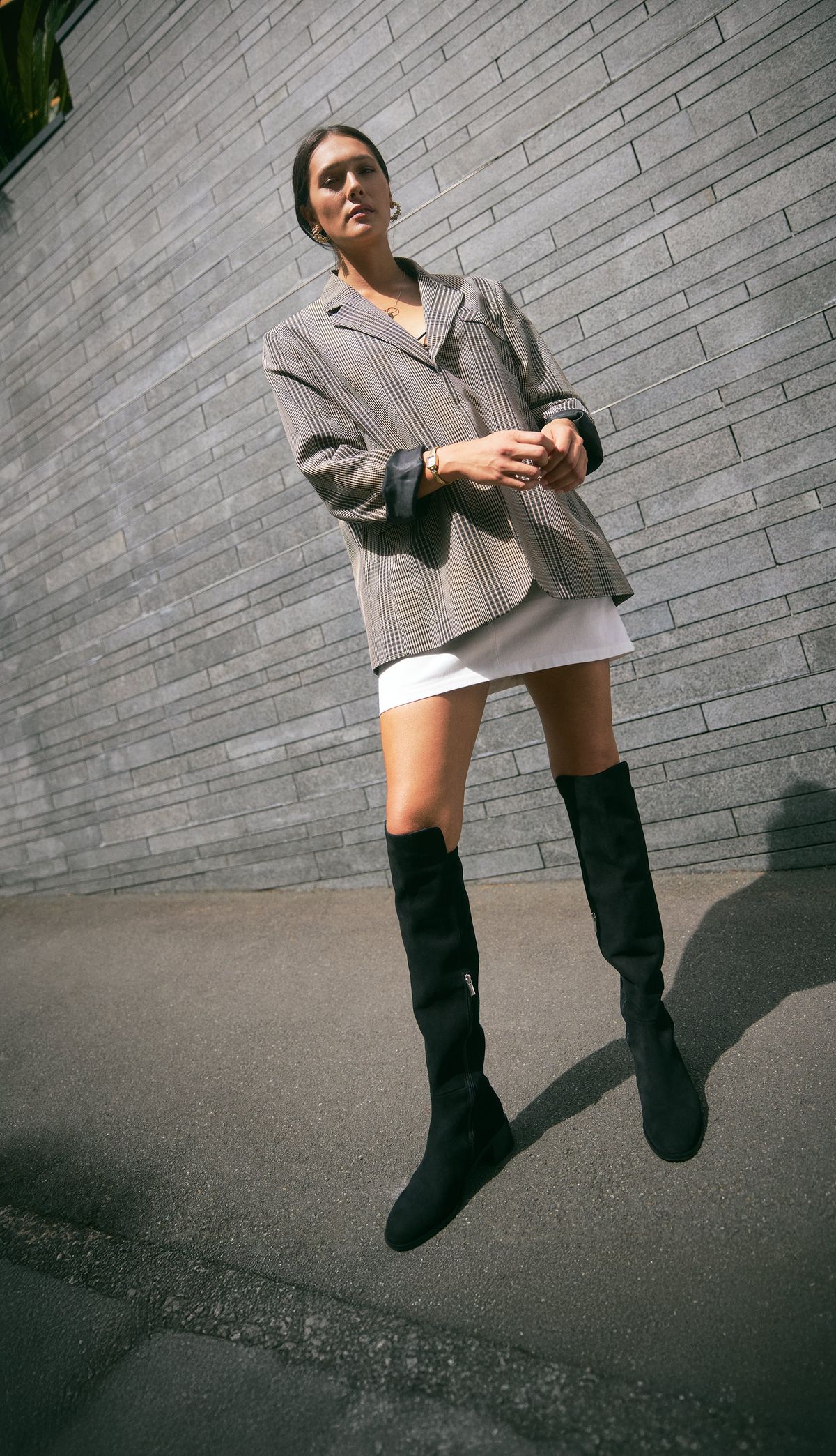 Knee-High Suede Boots paired with suit and skirt