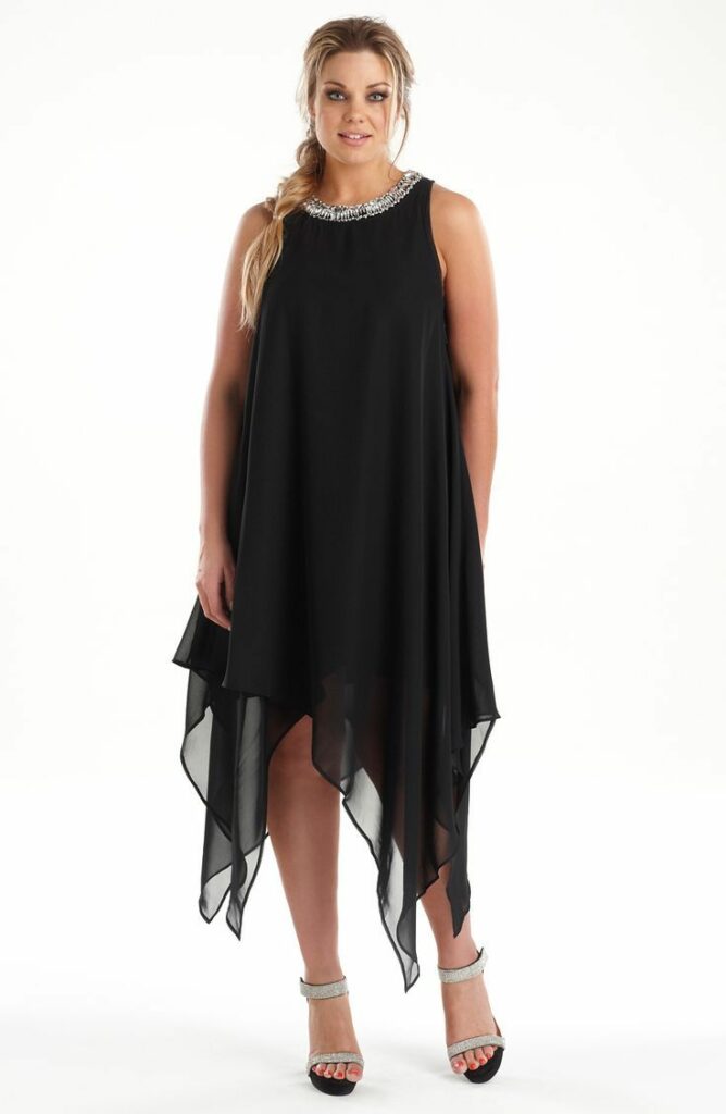 woman wearing a long black Cocktail Dress
