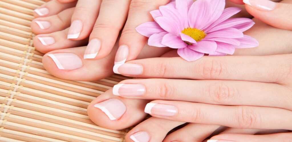 healthy nails with a pink flower