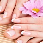 healthy nails with a pink flower
