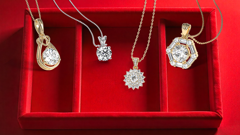 Multiple styles of diamond pendants, such as infinity, halo, vintage, and solitaire