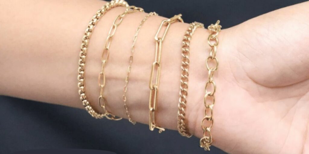 womans wrist wearing 5 bracelets for women