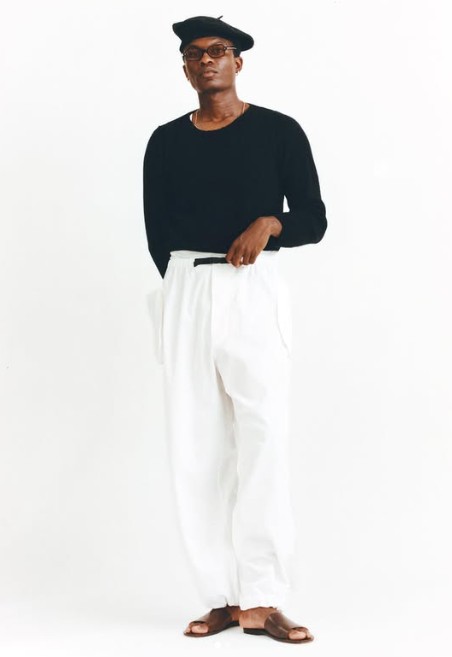 Conner McKnight white pants with black long sleeve top