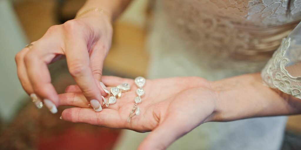Hands holding Pakistani Bridal necklace