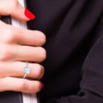 women's diamond ring on a hand