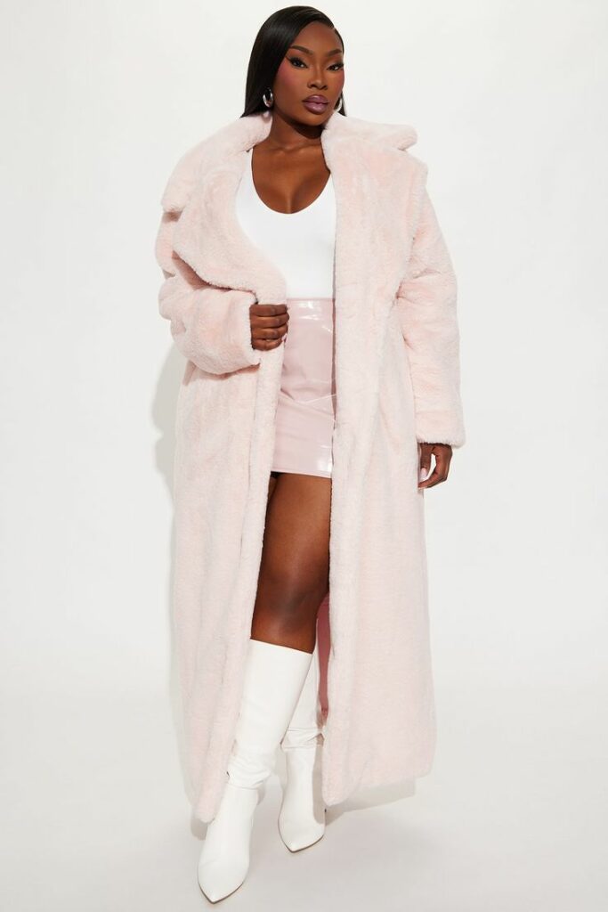 Pink Vintage natural Faux Fur Coat on model wearing white dress with white boots