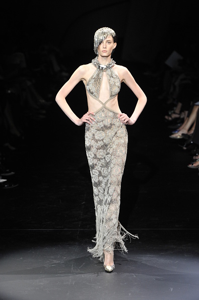 Model in Giorgio Armani Privé Backless Gown 