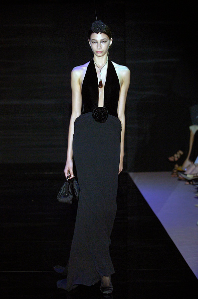 Australian fashion model Alexandra Agoston graces the runway at the Giorgio Armani Privé Haute Couture Fall/Winter 2005/2006 show.
