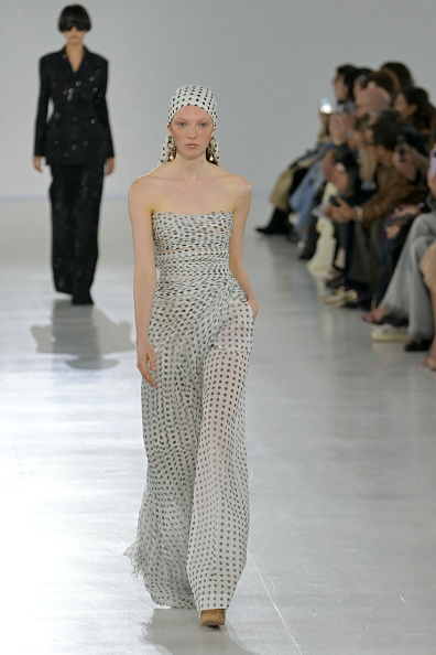 Zuza Bryk walks down the runway at the Ermanno Scervino Womenswear Spring/Summer 2026 collection presentation during Milan Fashion Week.