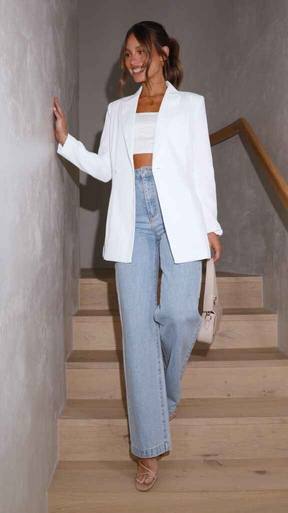 model in white oversized blazers