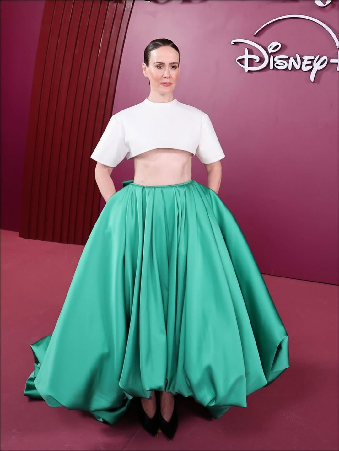 Sarah Paulson wears a Balenciaga Spring 2026 cropped top paired with a voluminous, pleated bubble skirt at the ‘All’s Fair’ Rio Premiere Red Carpet event.
