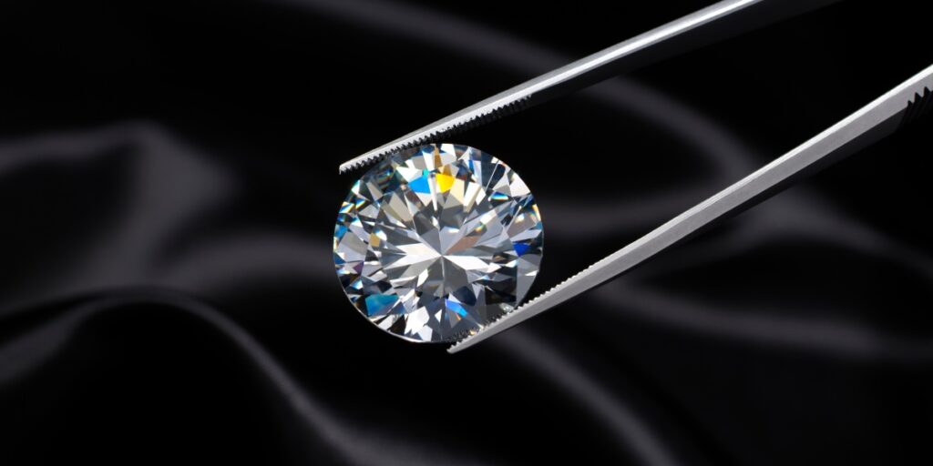 diamond in tweezers